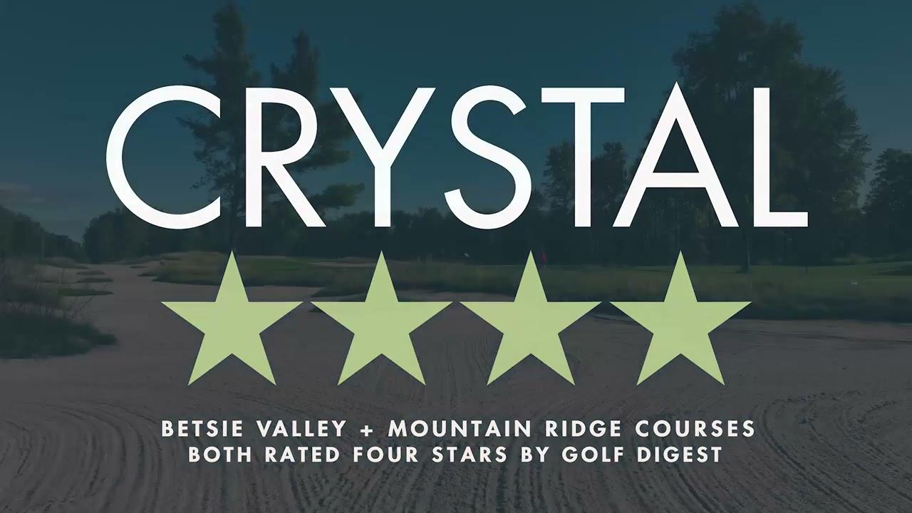 CRYSTAL logo with four green stars over a golf course background.